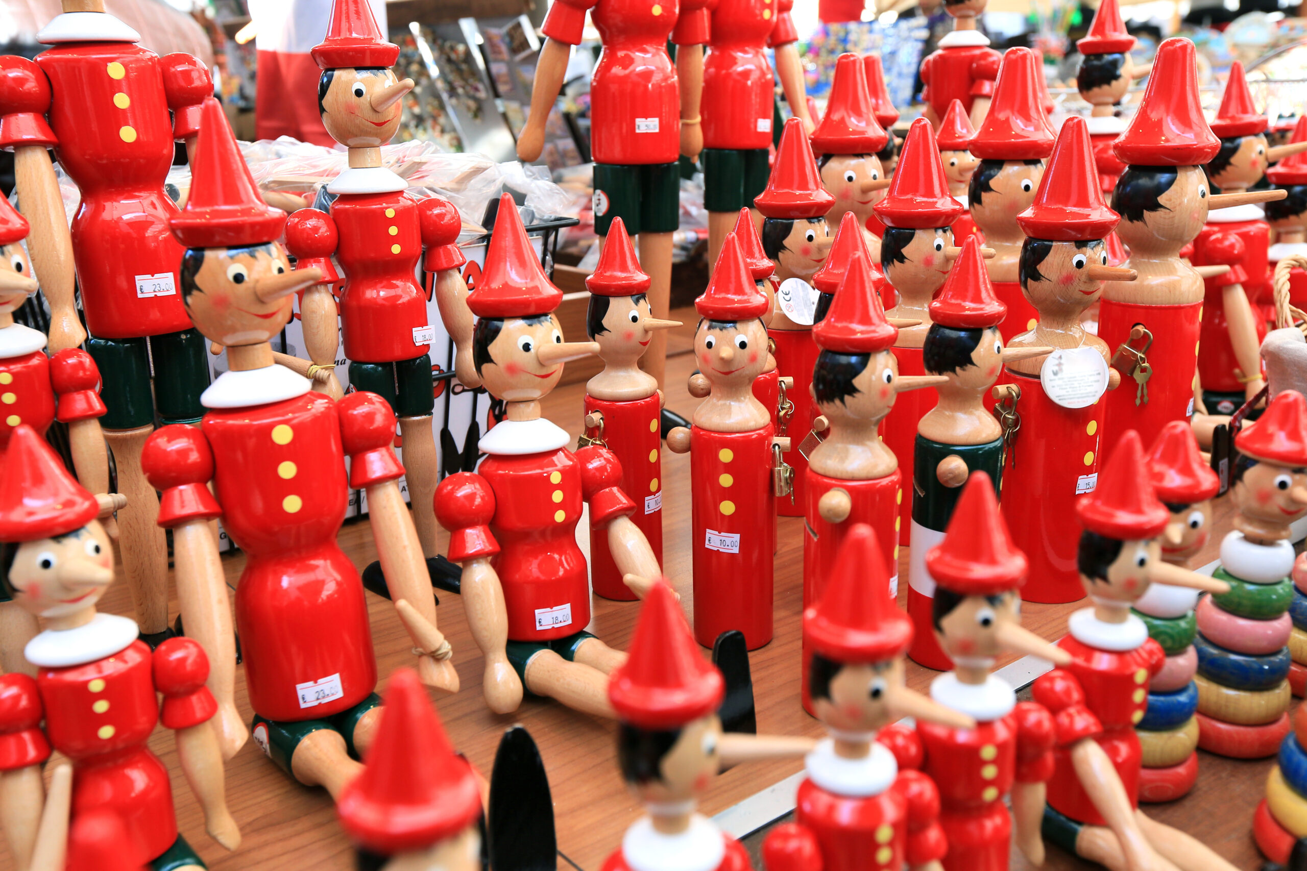 Painted wooden souvenir dolls of the figure of Pinocchio